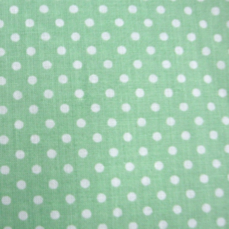 White dots in pastel green