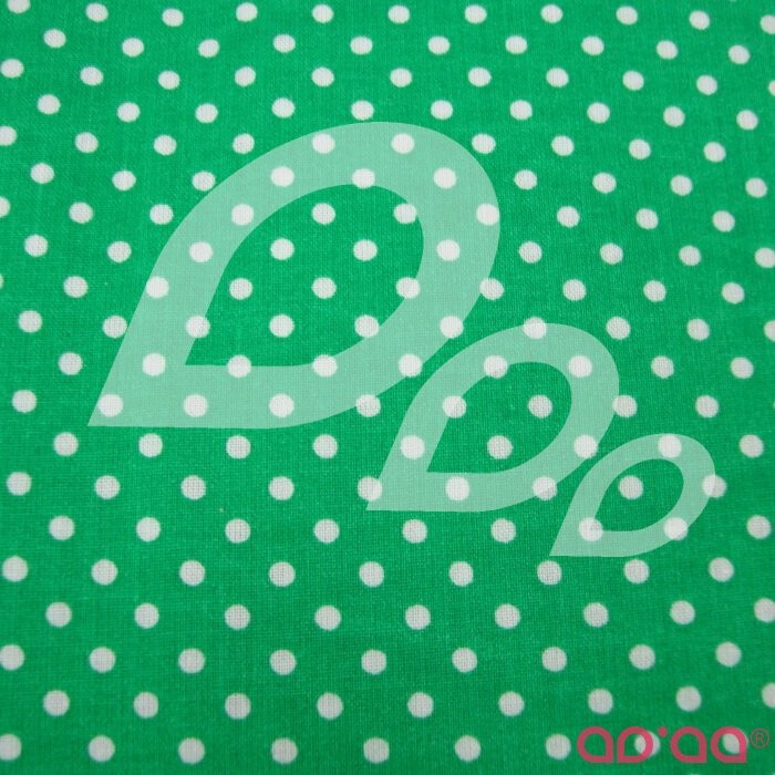 White dots in green