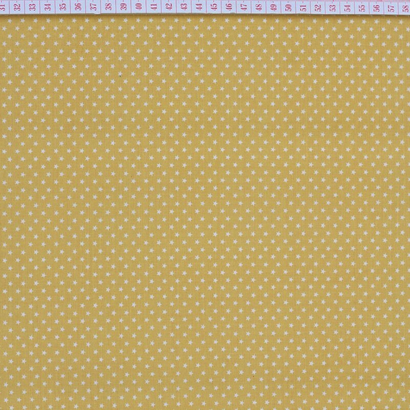 Tecido Cambraia com Estrelas em Branco com Fundo Amarelo Torrado