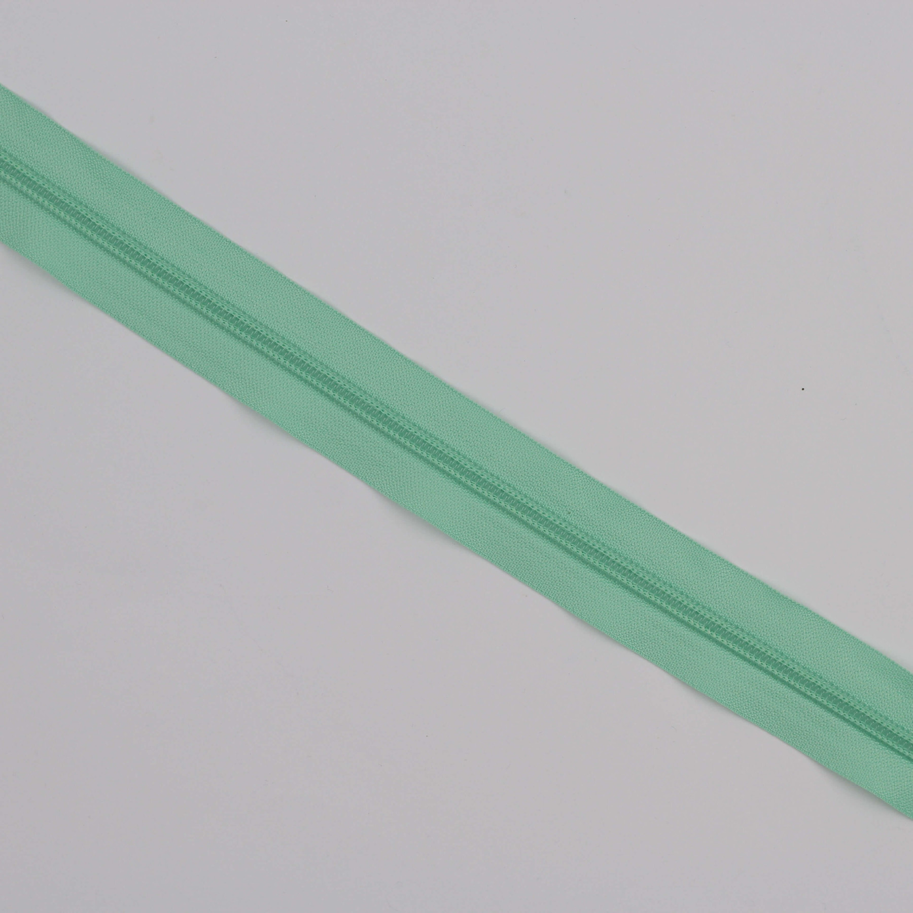 Fecho Zip 6 mm a metro – verde agua