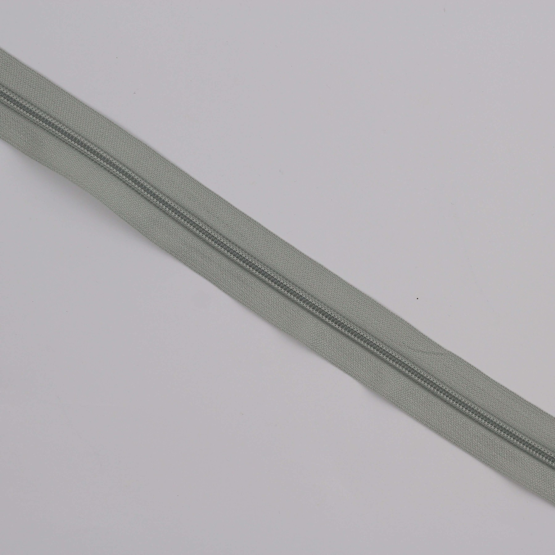 Fecho Zip 6 mm a metro - cinzento claro